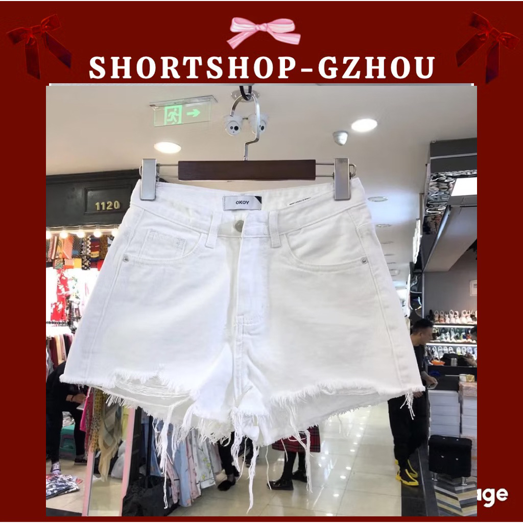 Quần short jean nữ rách ô nhỏ viền tua rua