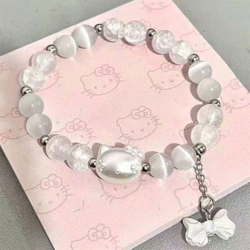 Vòng Tay Pha Lê Đá - Trắng kitty- nơ