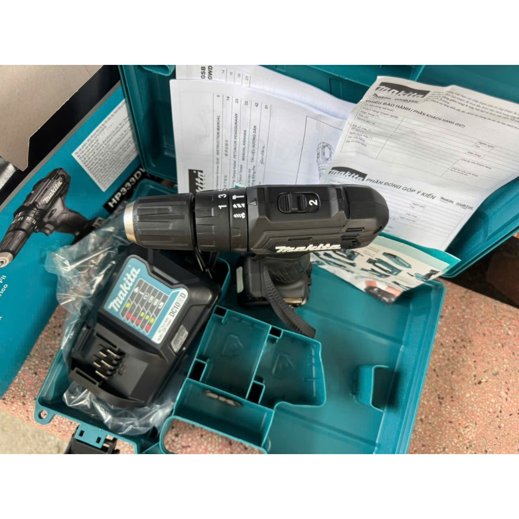 Máy khoan búa và vặn vít pin Makita HP333DWYB
