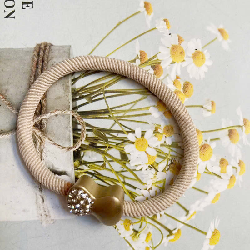 Dây buộc tóc thun màu đính hột nơ