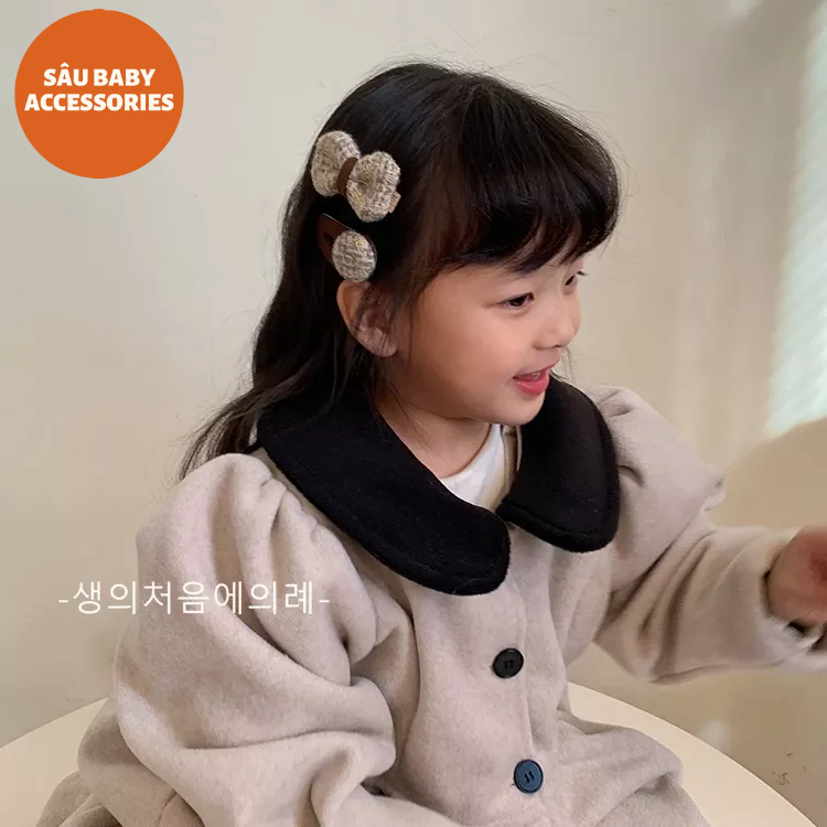 Sét hai chiếc kẹp tóc vải dạ kẻ lấp lánh cho bé