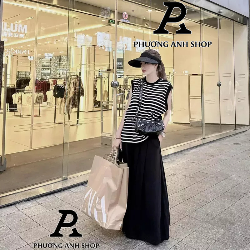 Set bộ áo thun kẻ sát nách mix quần ống rộng giả váy.