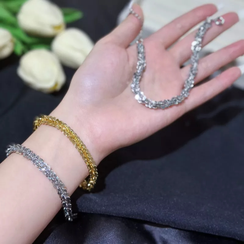 Lắc tay xoắn hoa mai chạm 5ly Trang sức Kami