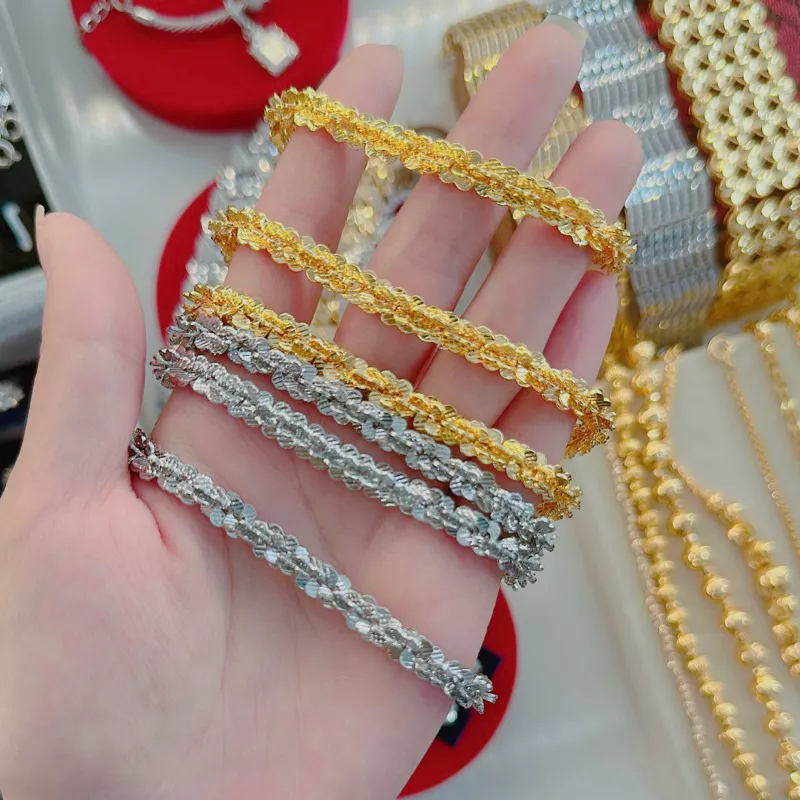 Lắc tay xoắn hoa mai chạm 5ly Trang sức Kami