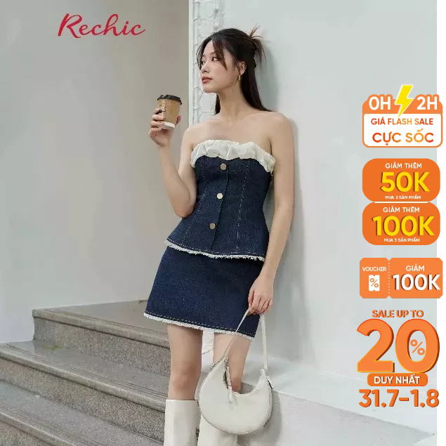 RECHIC Áo ống jean Camell bèo ngực đính hàng nút bèo tà dưới cá tính năng động