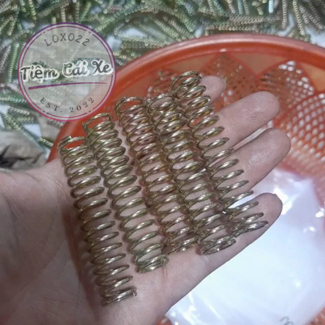Lò xo thắng sau/ đũa tay ga