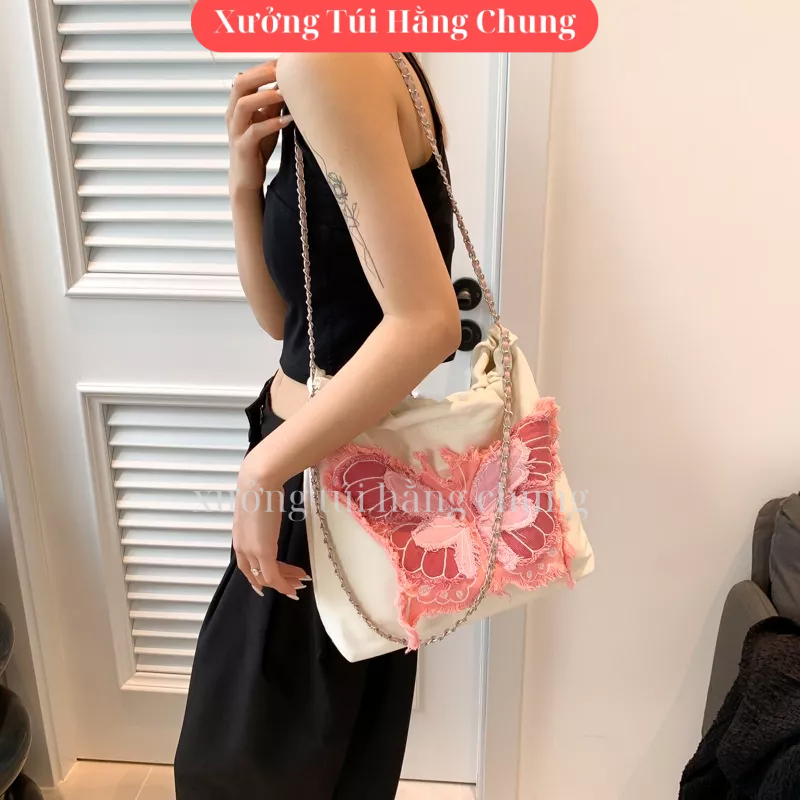 Túi đeo chéo đeo vai hình nơ chất vải canvas khóa rút mẫu mới cực hot