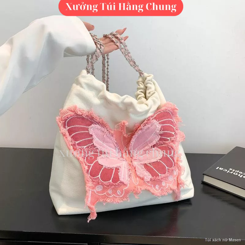 Túi đeo chéo đeo vai hình nơ chất vải canvas khóa rút mẫu mới cực hot