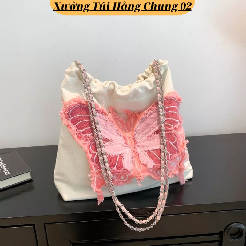 Túi xách nữ đeo chéo hình bướm chất vải denim dây rút màu xanh hồng mẫu mới phong cách hàn quốc