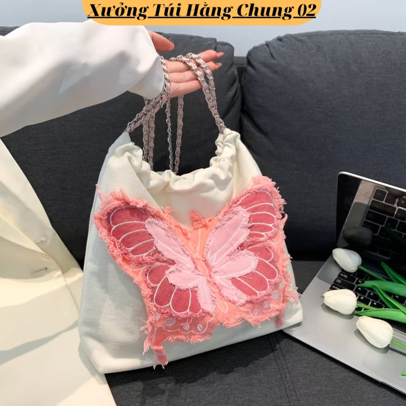 Túi xách nữ đeo chéo hình bướm chất vải denim dây rút màu xanh hồng mẫu mới phong cách hàn quốc