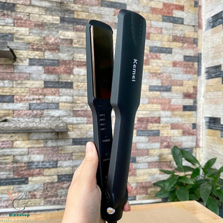 máy duỗi tóc kemei 329 có 4 mức chỉnh nhiệt