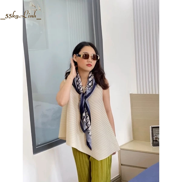 Áo nữ thun lò xo kiểu dáng vạt xéo sát nách, chất vải thun lò xo dập ly cao cấp - 55KG.LINH