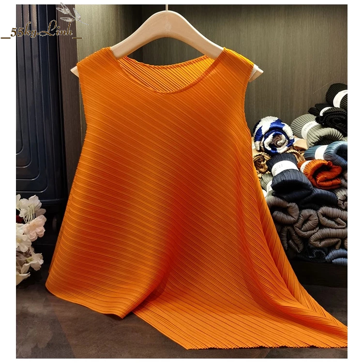 Áo nữ thun lò xo kiểu dáng vạt xéo sát nách, chất vải thun lò xo dập ly cao cấp - 55KG.LINH