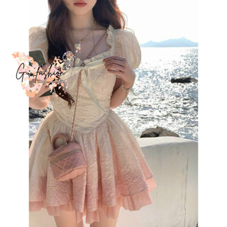 Đầm gấm loang phối màu cố bèo buộc nơ ngực có mút