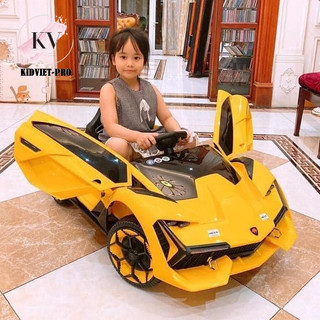 Ô Tô Điện  KIDVIET-PRO Lamboghini NEL 603 2 Cánh Mở Chéo Thể Thao, 2 Động Cơ, Tải Trọng 50KG (Vàng-Đỏ)