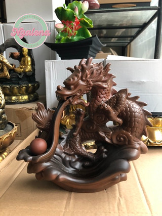 Thác khói trầm hương phi long phun châu