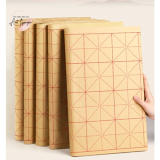 Giấy tập viết thư pháp kẻ ô mễ màu vàng kích thước 39x65cm 70 tờ ô 9cm luyện chữ