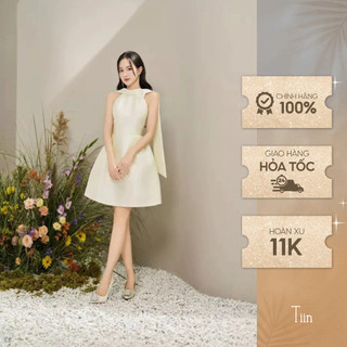 Váy cổ yếm sang chảnh thiết kế vạt lưng kèm hoa cài màu kem đầm kiểu nữ tiểu thư dự tiệc sang trọng TIINSTORE V0D1039
