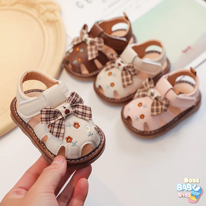 Sandal Tập Đi Cho Bé Gái 0-2 Tuổi. Đế Mềm Có Kèn Chống Trơn Hoạ Tiết Hoa Nhí Gắn Nơ ( L3 )