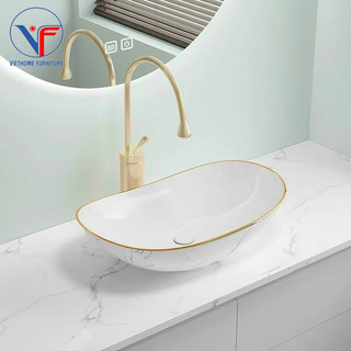 Lavabo thỏi trắng viền vàng có vân