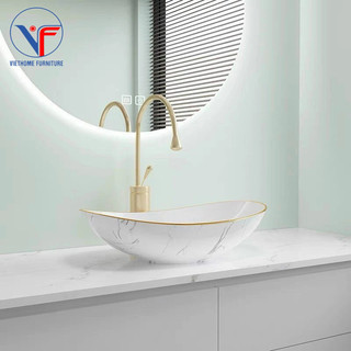 Lavabo thỏi trắng viền vàng có vân