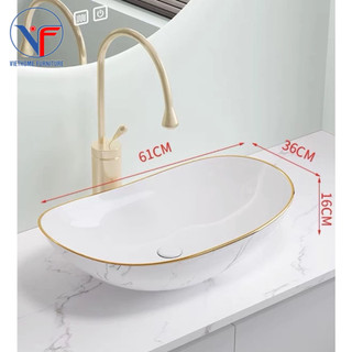 Lavabo thỏi trắng viền vàng có vân