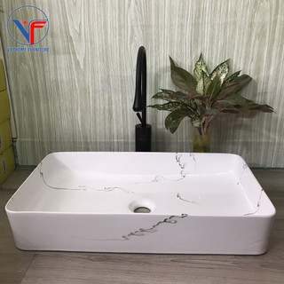 LAVABO hình chữ nhật giả đá trắng vân đen