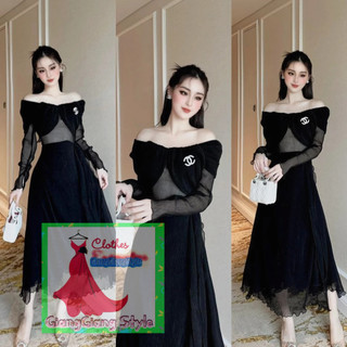 VÁY ĐEN XÒE DÀI VAI BÈO TRỄ VAI ĐÍNH TAG TAY DÀI 171023