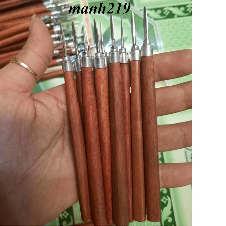 lấy khoé cán gỗ đầu Inox manh219 nail