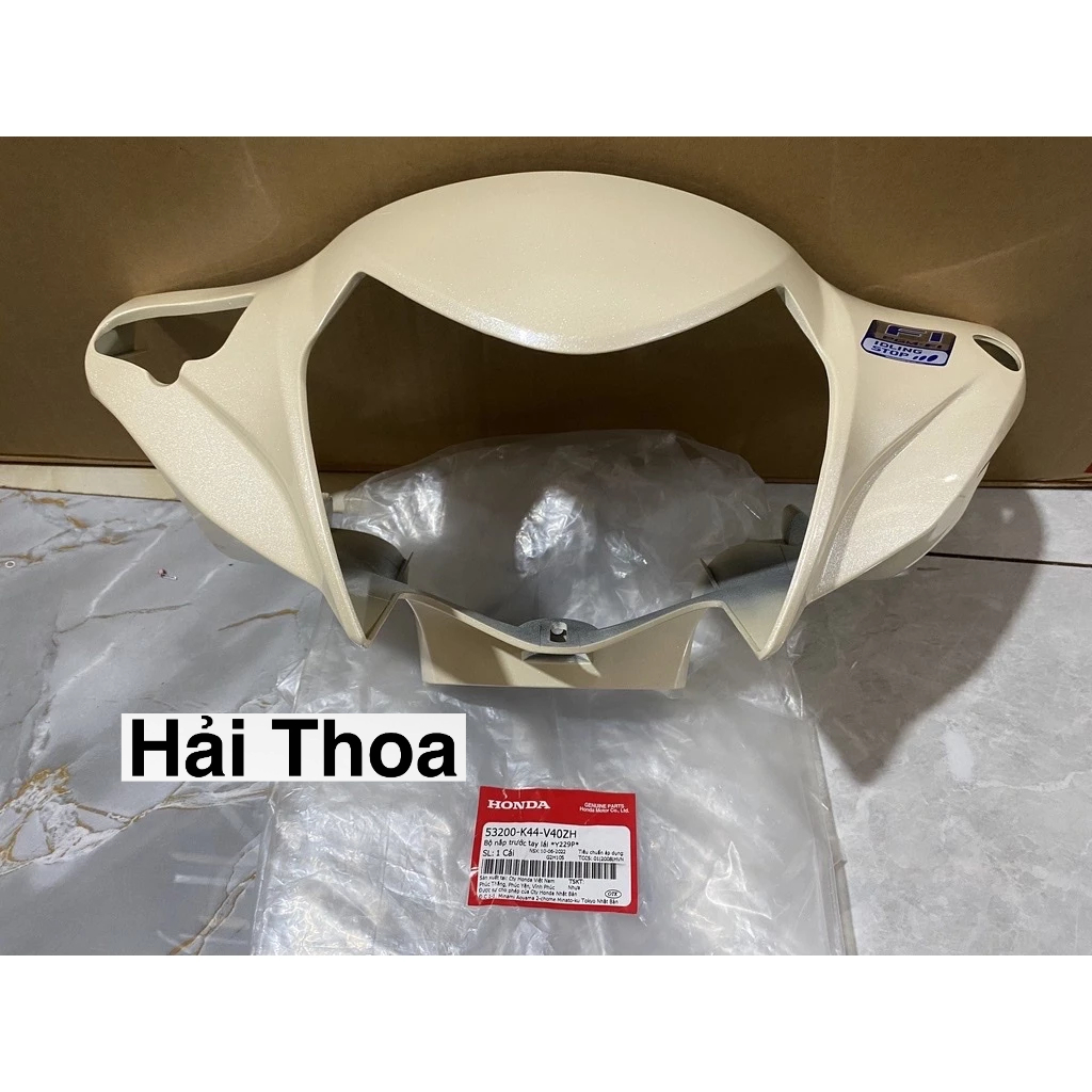 Bàn Thờ (Nắp Trước Tay Lái) Vision 125 ( 2014 > 2019 ) Vàng Nhạt Honda ( 53200K44V40ZH )